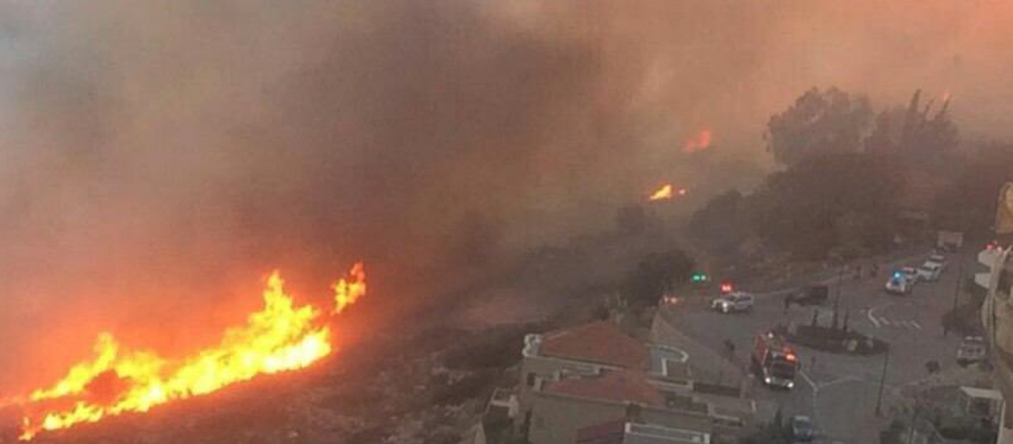 Thousands evacuated as fires spread across Israel
