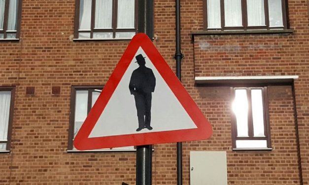 Artist behind ‘beware of Jews’ street sign apologises