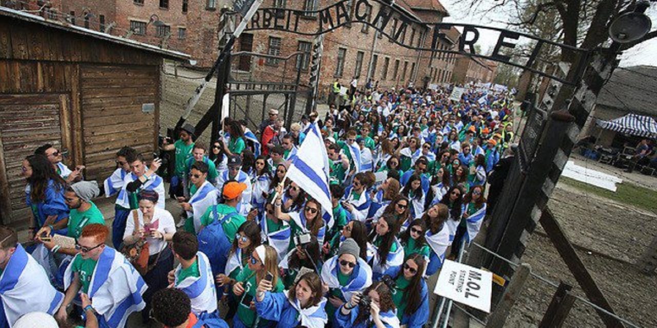 Thousands of Jewish young people march at Auschwitz for March of the Living