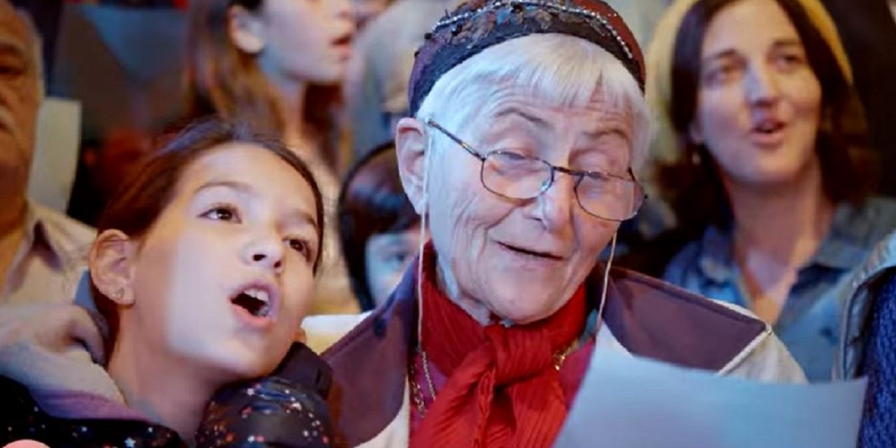 WATCH: 600 Holocaust survivors and their families sing moving song “Chai”
