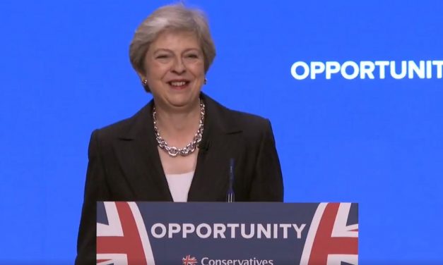 Theresa May takes aim at Corbyn’s “bogus solutions” to anti-Semitism in conference speech