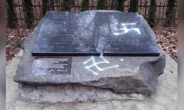 Poland: Swastikas daubed on memorial stone at Holocaust mass grave