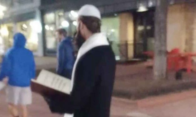 Men dressed as Jews hand out Holocaust denial flyers in Colorado