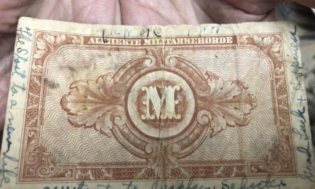 Written message on banknote helps Auschwitz survivor trace American liberator