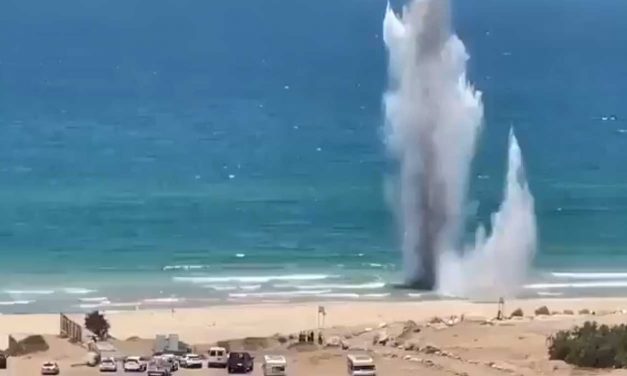 Israeli police blow up unexploded Hamas rocket on beach