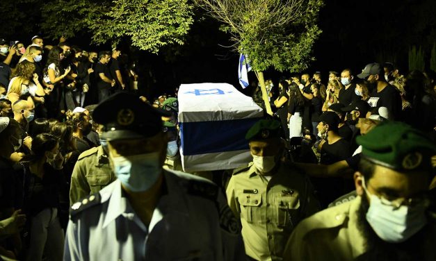 Israelis mourn and Palestinians celebrate the murder of a young Israeli policeman