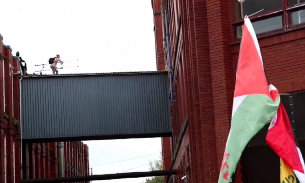 UK: Anti-Israel protester falls through roof whilst climbing on Israeli-owned factory