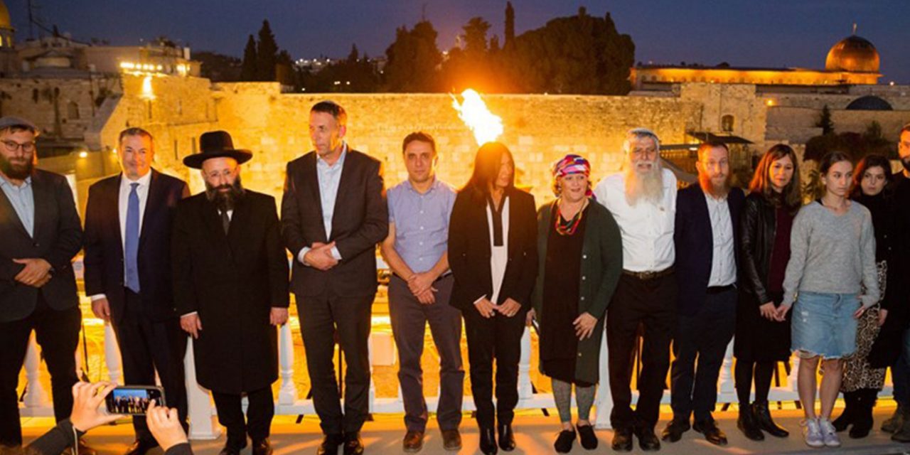 Hanukkah candles lit at Western Wall in memory of Eli Kay