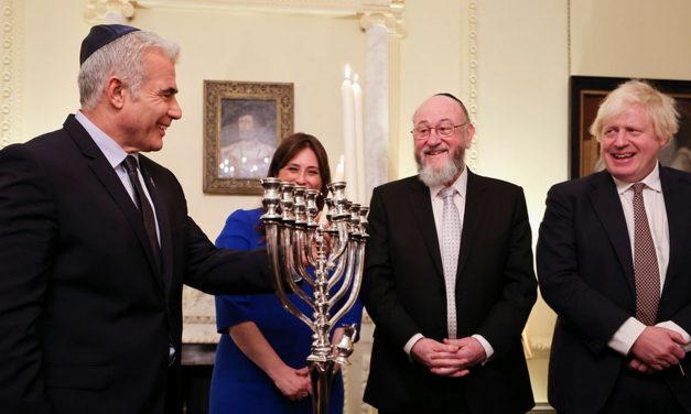 Boris lights Hanukkah menorah with Israel’s Foreign Minister, the Israeli Ambassador and Chief Rabbi at No 10