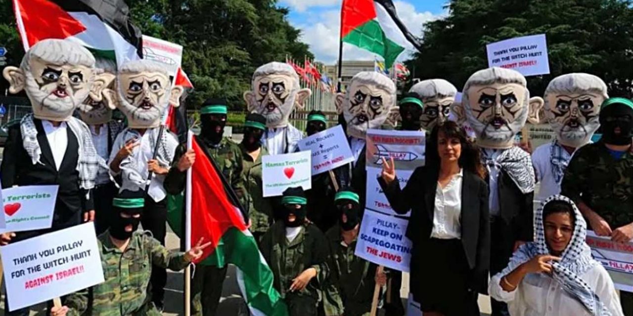Israeli protesters mock UNHRC by dressing as Hamas leader and thanking the anti-Israel organisation