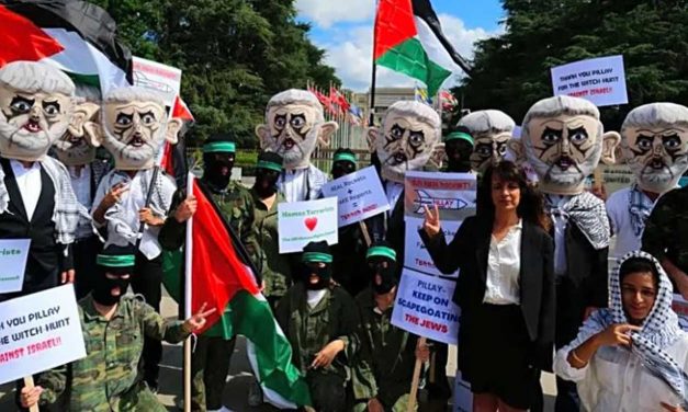 Israeli protesters mock UNHRC by dressing as Hamas leader and thanking the anti-Israel organisation
