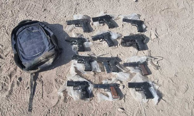 Israeli police seize 12 hand guns being smuggled on Jordanian border