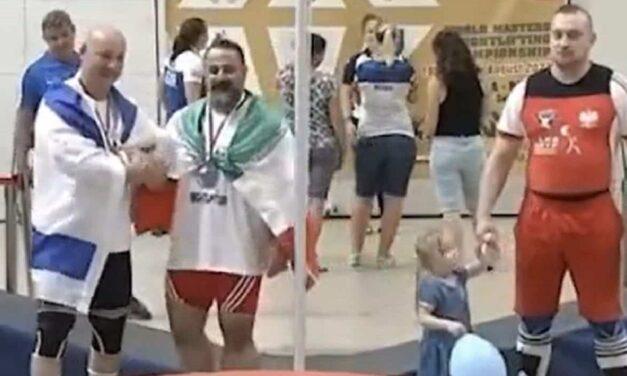 Iranian weightlifter banned FOR LIFE after shaking hands with Israeli at championships