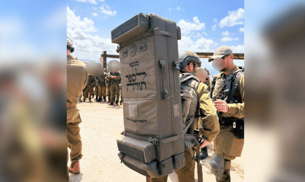Carrying the Torah into Battle: What this image reveals about Israel – and why Christians can’t ignore it