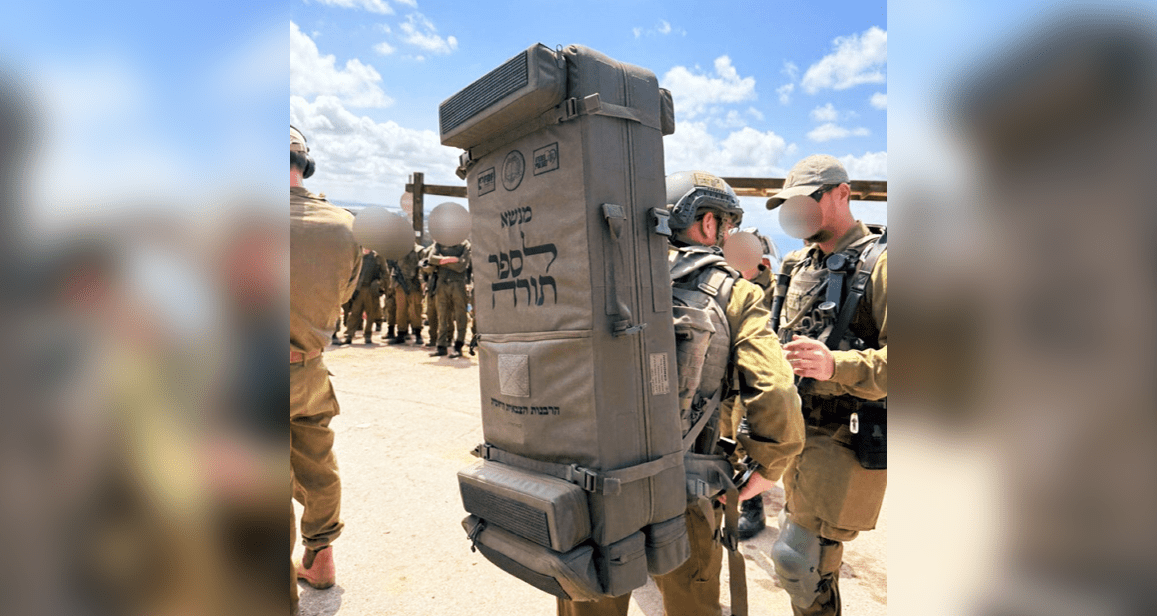 Carrying the Torah into Battle: What this image reveals about Israel – and why Christians can’t ignore it